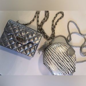 Silver crossbody handbags.